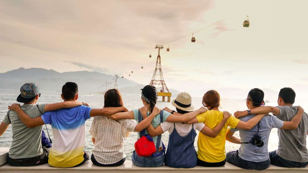 A group of friends travelling together. Travel Trends 2024.